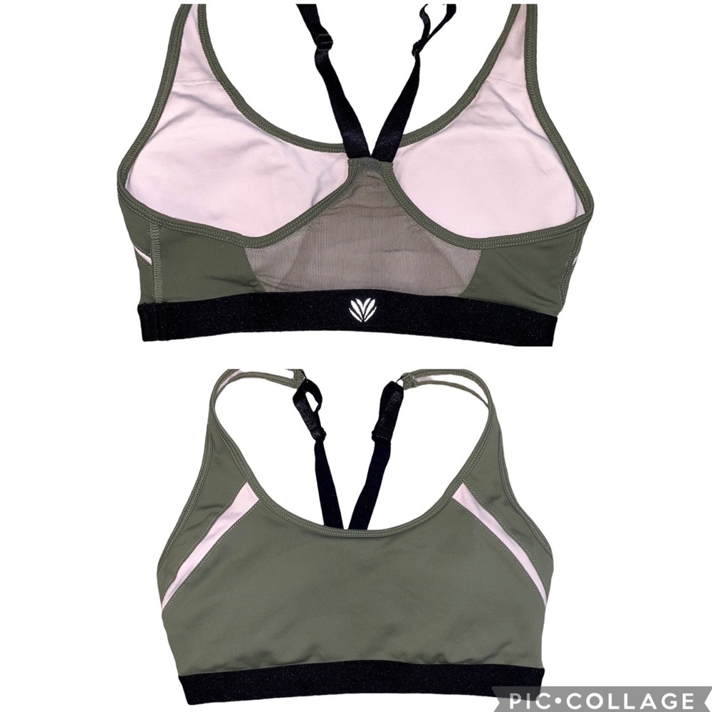Sage green and pink sports bra with mesh detailing. Padded adjustable straps